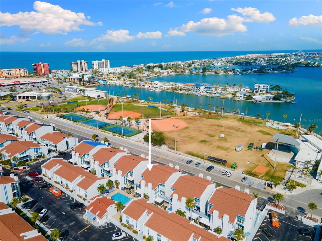 337 Rex Place, Unit G Madeira Beach, FL 33708 - Photo 33 of 40 a view of an ocean with city