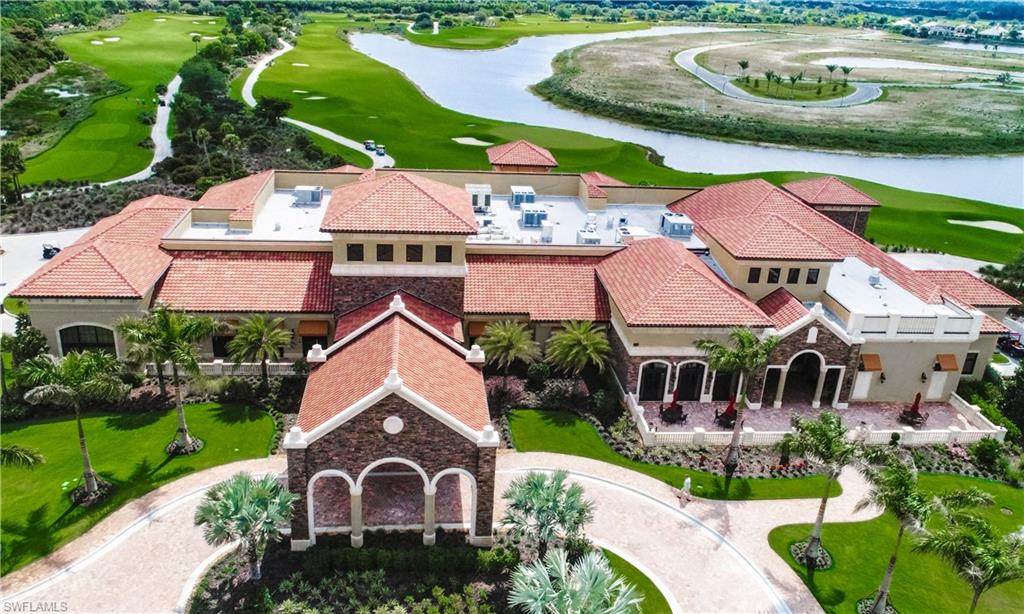 9572 Trevi Court, Unit 5015 Naples, FL 34113 - Photo 23 of 39 an aerial view of a house