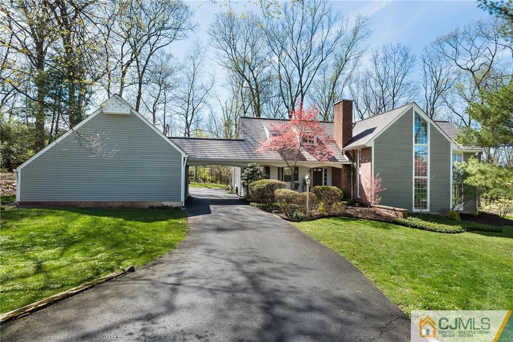 109 Rolling Hill Road Skillman, NJ 08558 - Photo 2 of 25 a front view of a house with garden