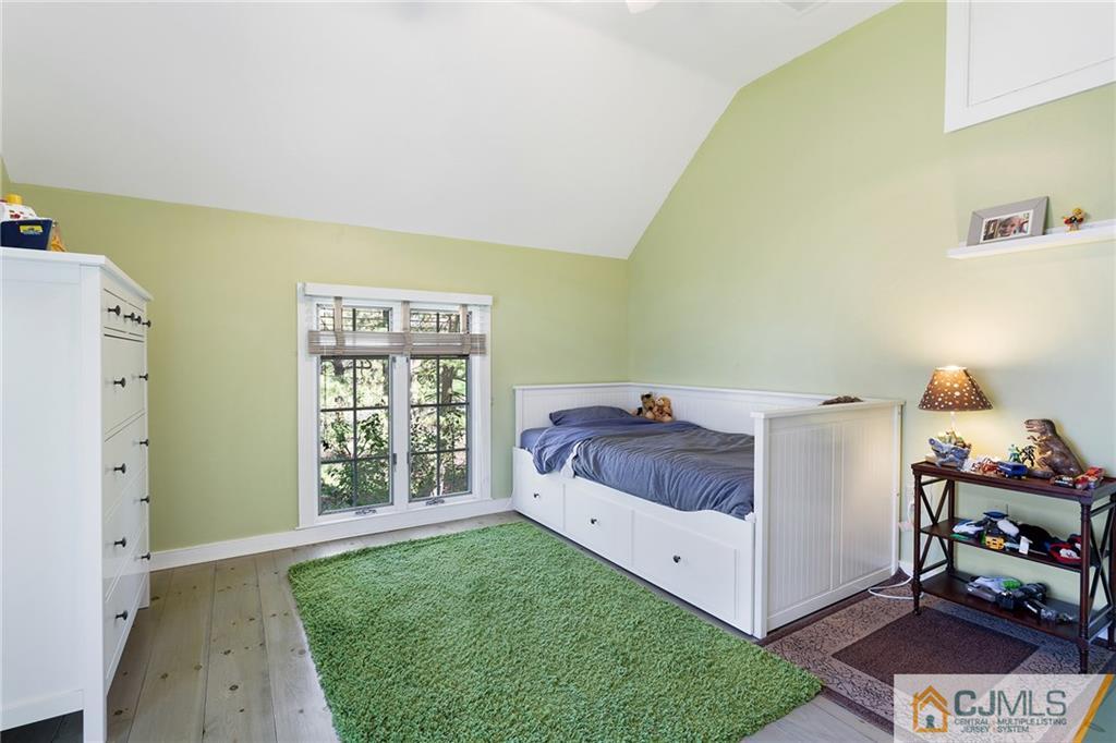 109 Rolling Hill Road Skillman, NJ 08558 - Photo 17 of 25 a bed room with a bed and a window