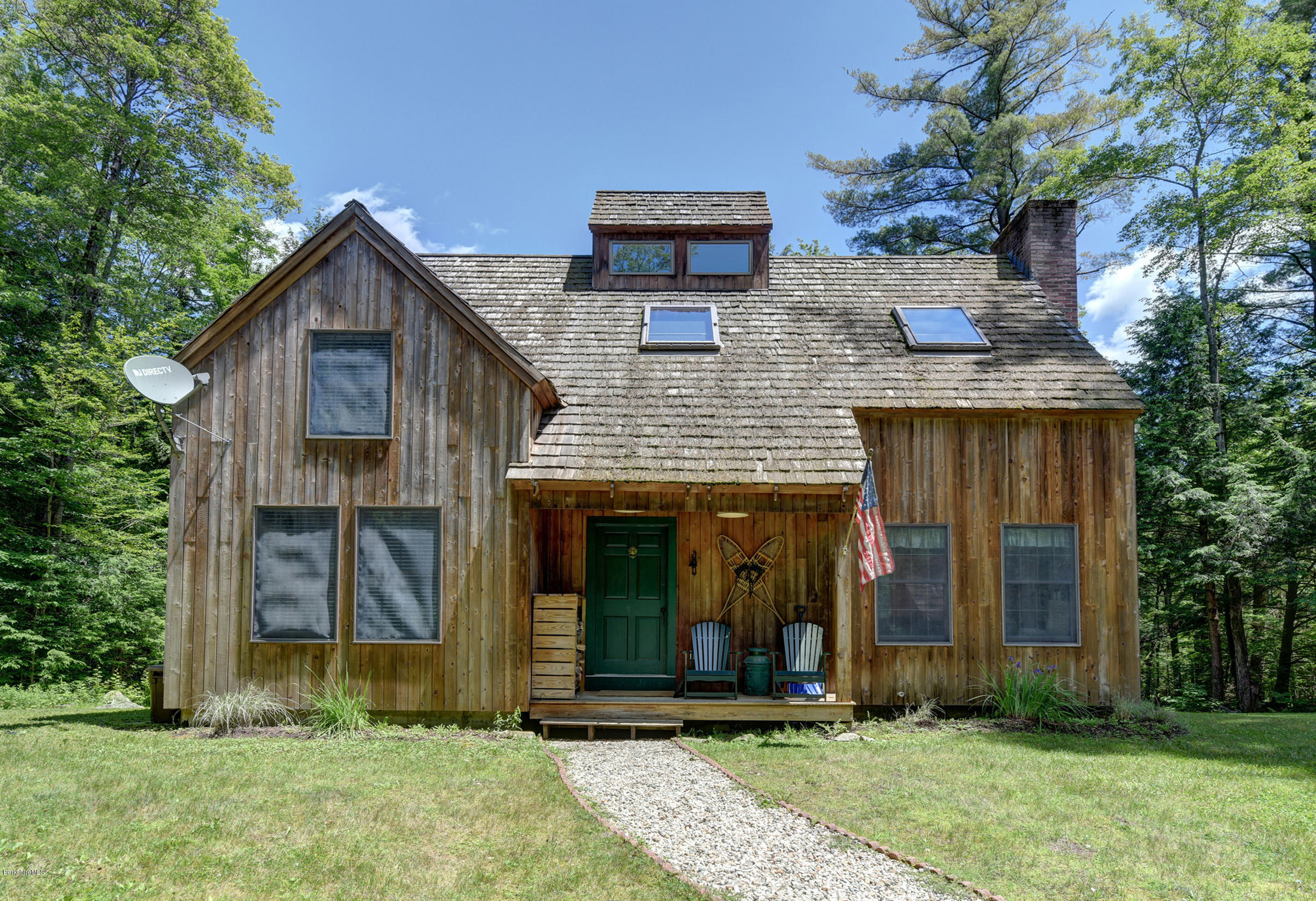 726 North Main Road Otis, MA 01253 - Photo 30 of 30 front view of a house with a yard