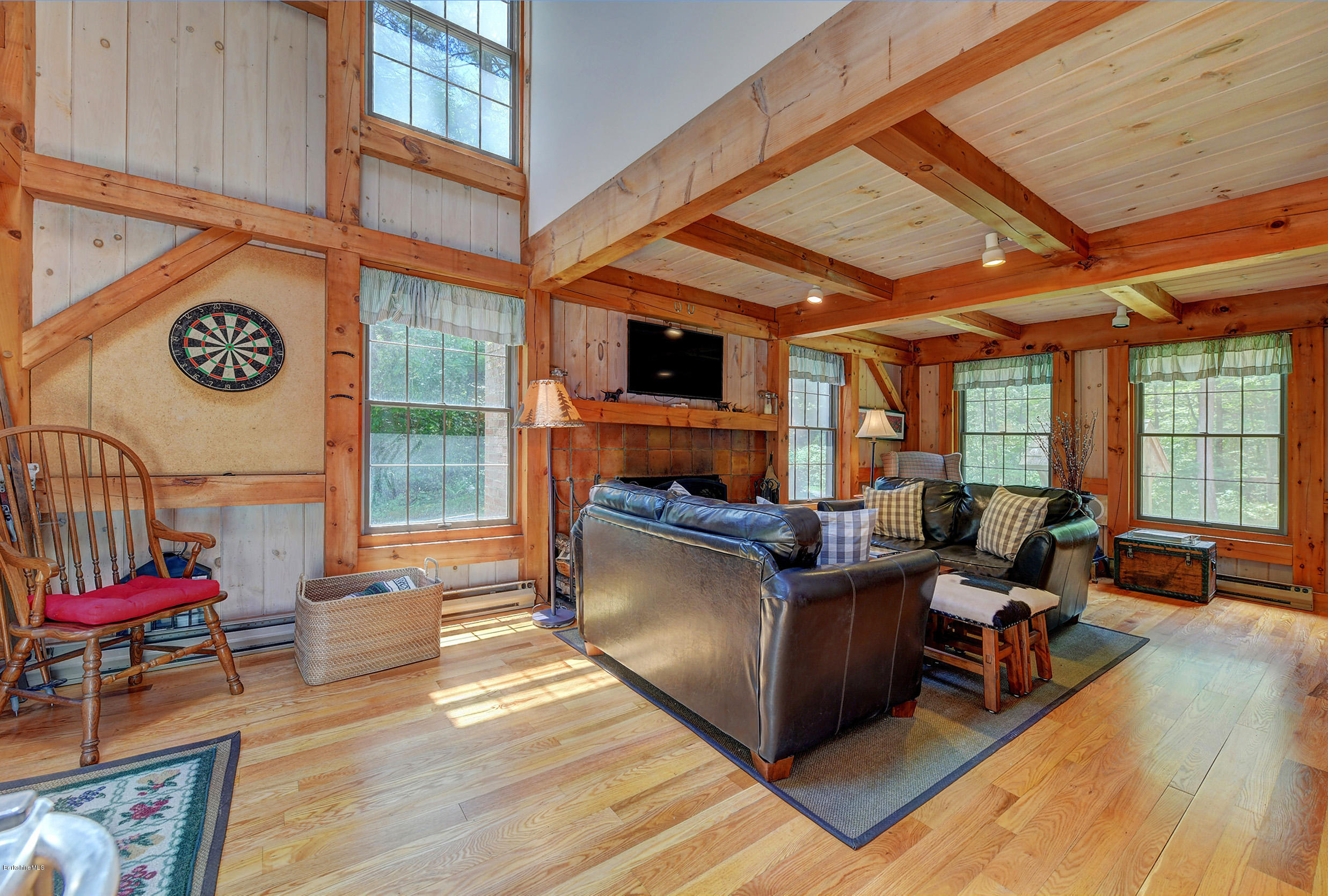 726 North Main Road Otis, MA 01253 - Photo 7 of 30 a living room with furniture and a flat screen tv