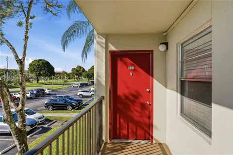 a view of balcony and wooden floor
