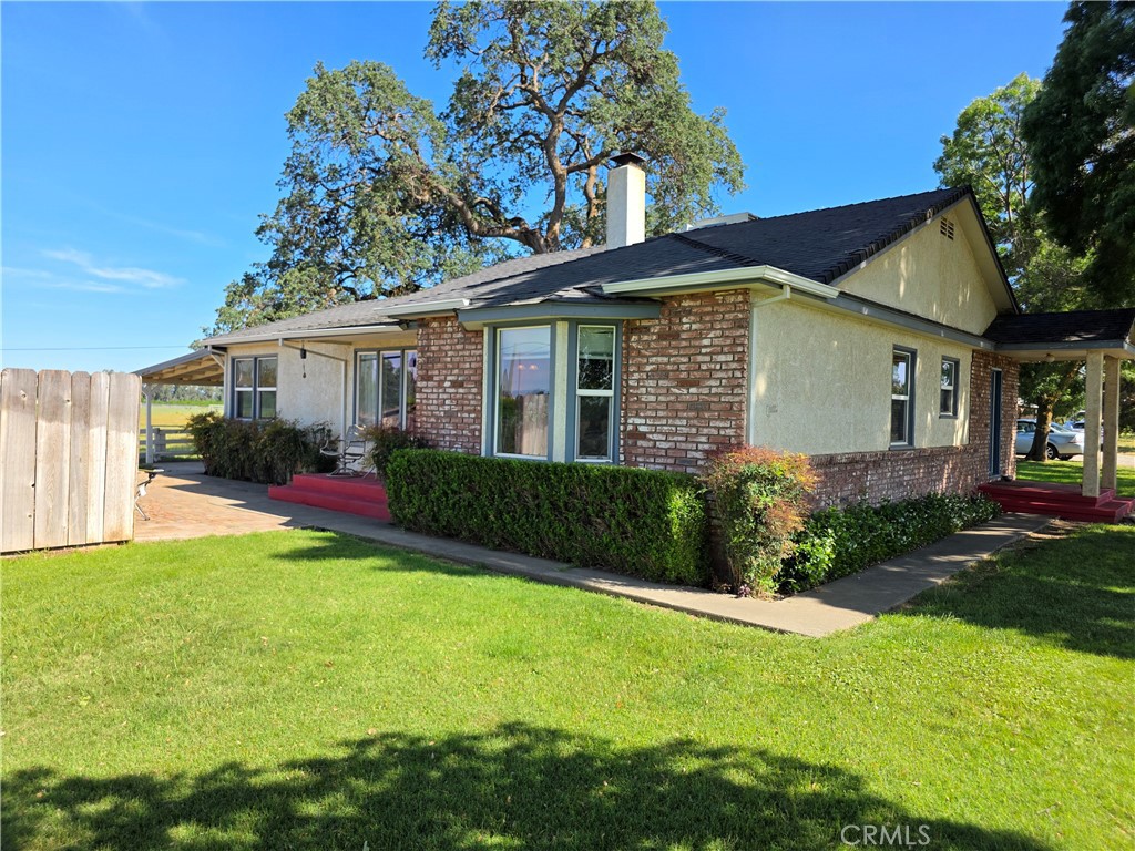 23773 River Road Corning, CA 96021 - Photo 62 of 64 a front view of house with yard and green space