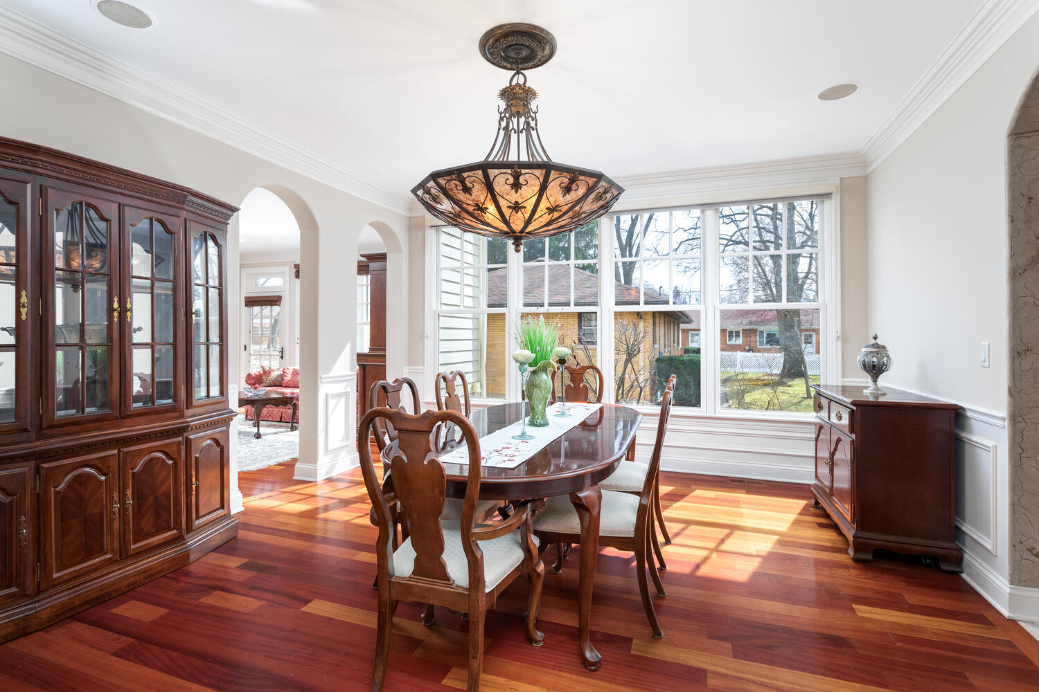 655 Sunset Drive Naperville, IL 60540 - Photo 12 of 61 a view of a dining room with furniture window and wooden floor