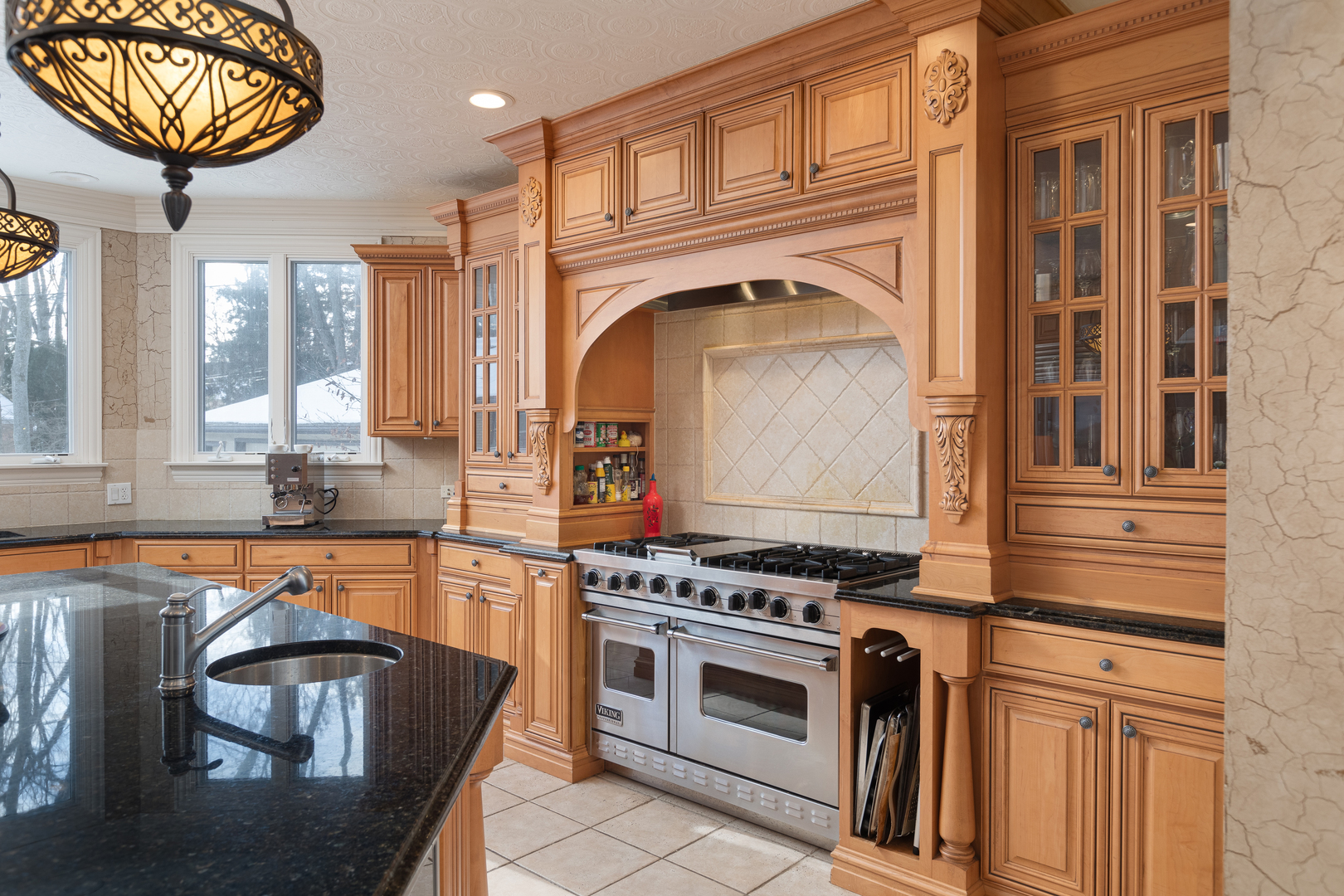655 Sunset Drive Naperville, IL 60540 - Photo 15 of 61 a kitchen with stainless steel appliances granite countertop a stove a sink and a refrigerator
