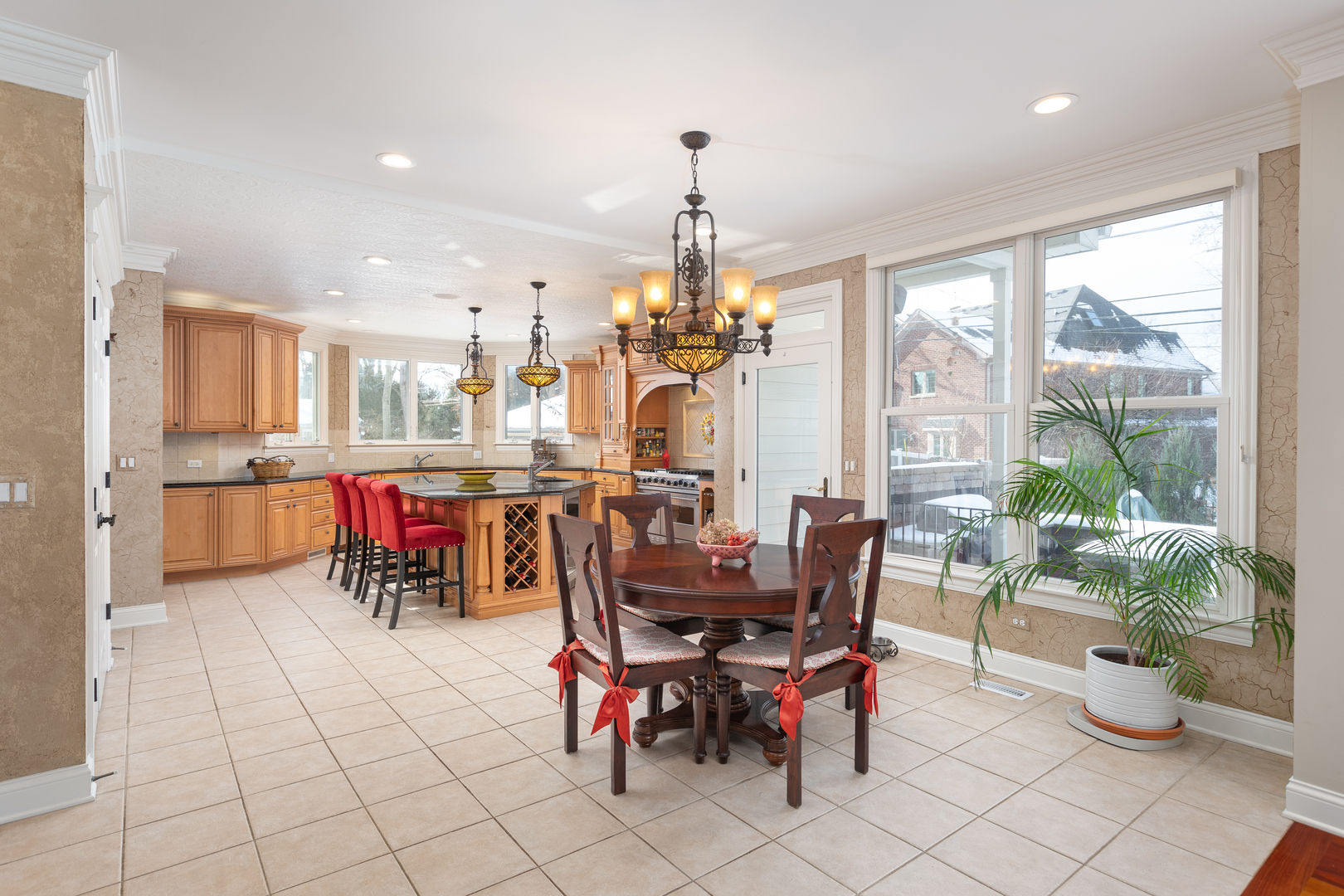 655 Sunset Drive Naperville, IL 60540 - Photo 22 of 61 a view of a dining room with furniture window and outside view