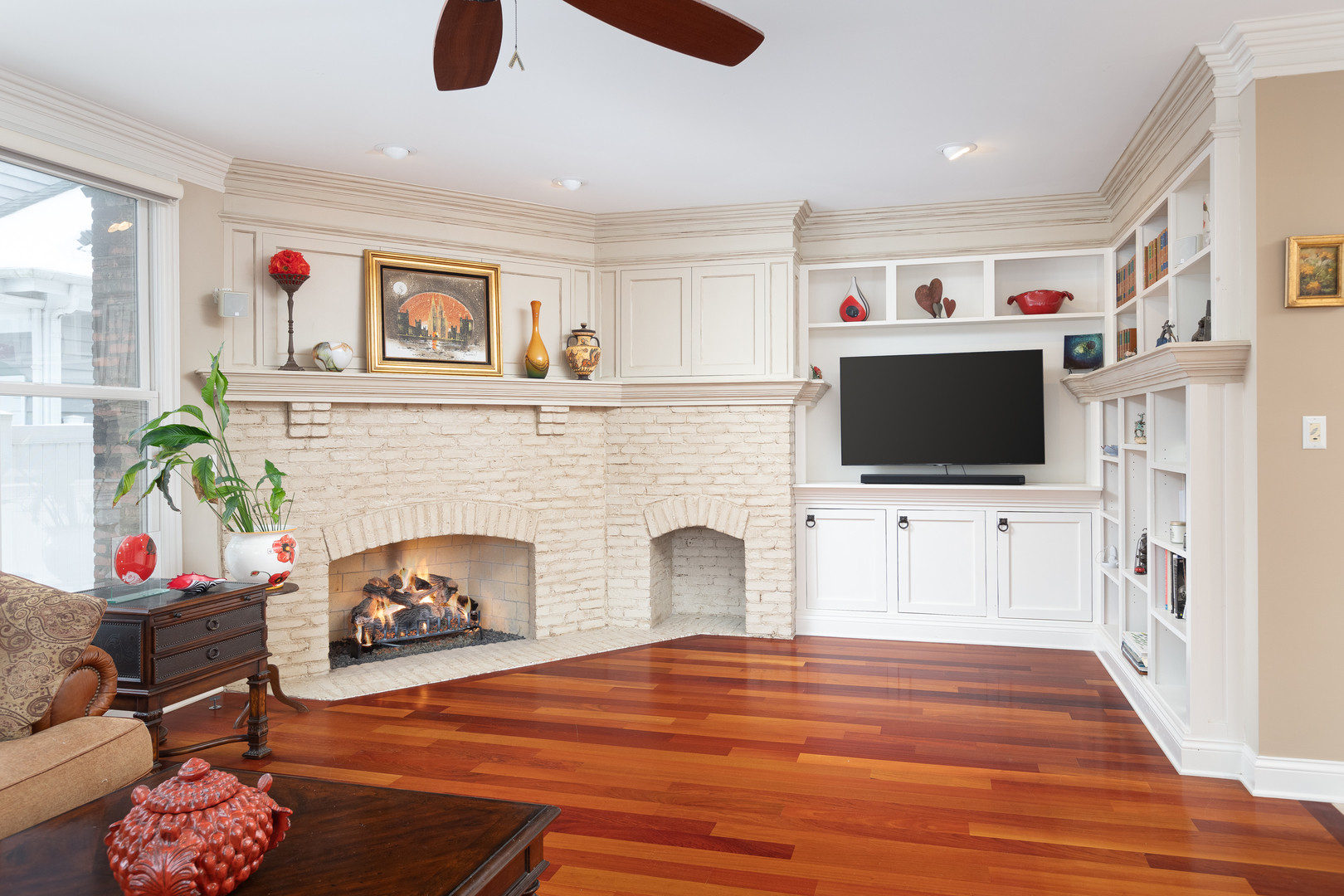 655 Sunset Drive Naperville, IL 60540 - Photo 28 of 61 a living room with furniture and a flat screen tv