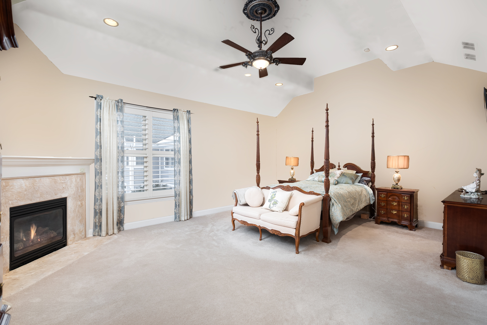 655 Sunset Drive Naperville, IL 60540 - Photo 34 of 61 a bed room with a bed furniture and a fireplace