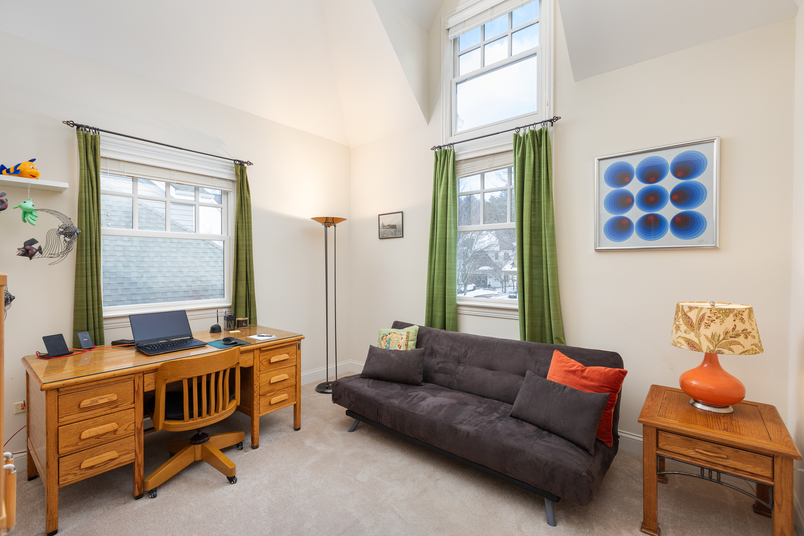 655 Sunset Drive Naperville, IL 60540 - Photo 38 of 61 a living room with furniture and a window