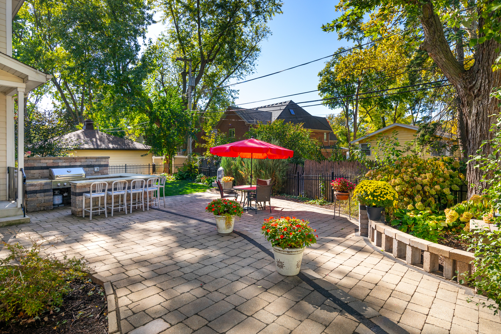 655 Sunset Drive Naperville, IL 60540 - Photo 50 of 61 a view of a chairs and table in the patio