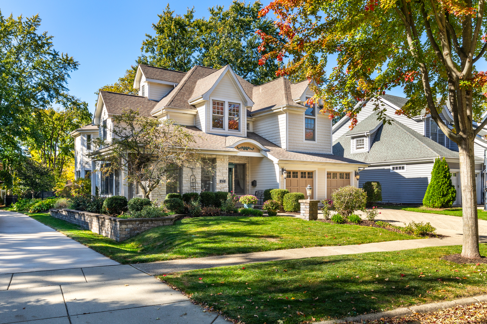 655 Sunset Drive Naperville, IL 60540 - Photo 51 of 61 a front view of a house with a yard