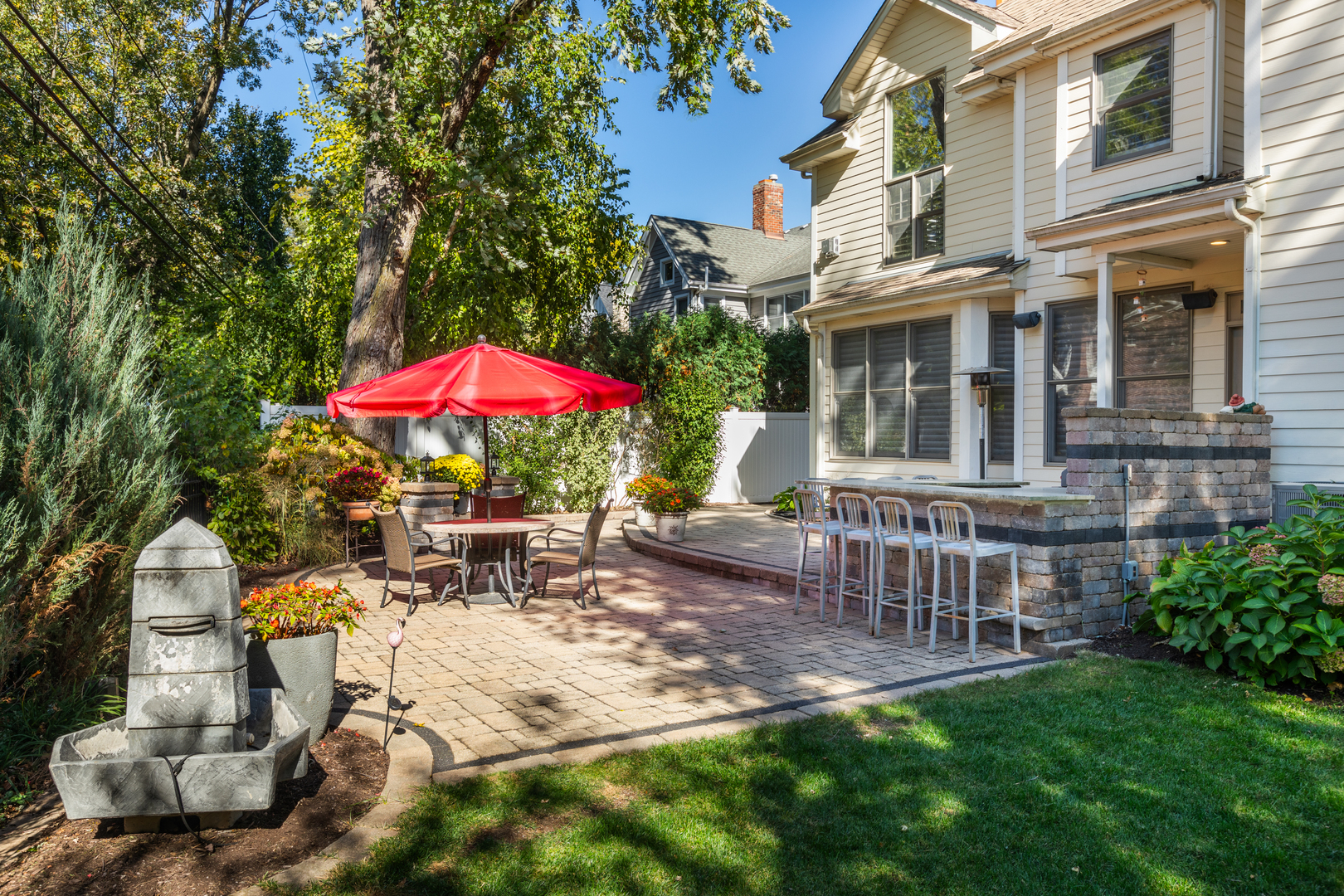 655 Sunset Drive Naperville, IL 60540 - Photo 53 of 61 a view of a house with backyard and sitting area