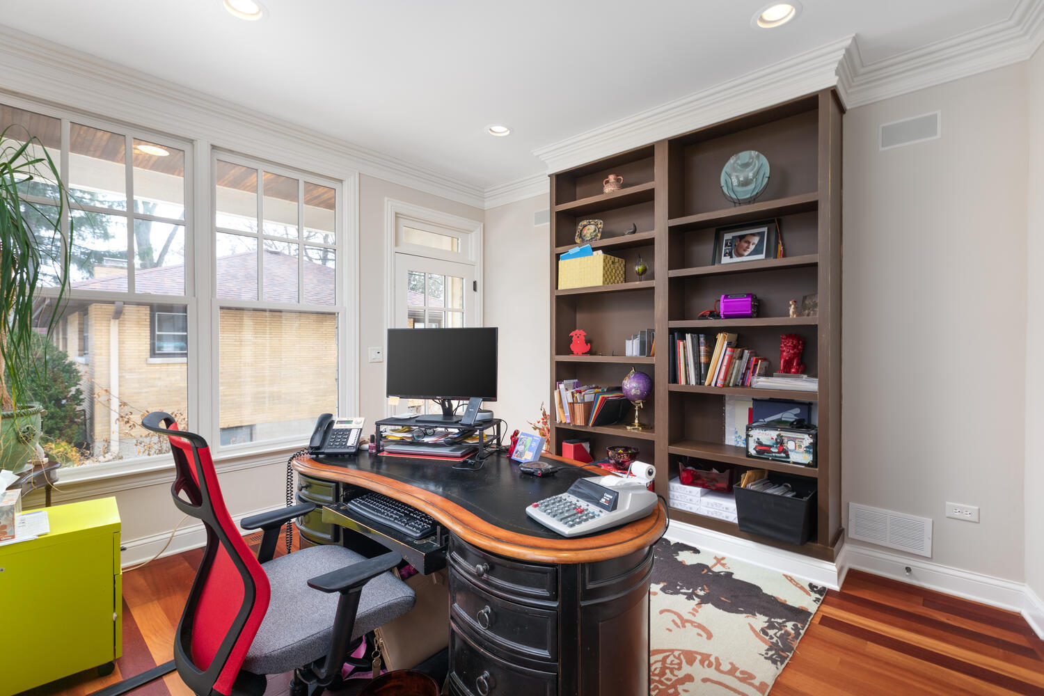 655 Sunset Drive Naperville, IL 60540 - Photo 8 of 61 a work room with furniture a rug and a window