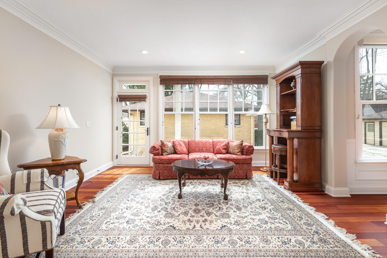 655 Sunset Drive Naperville, IL 60540 - Photo 9 of 61 a living room with furniture and a window