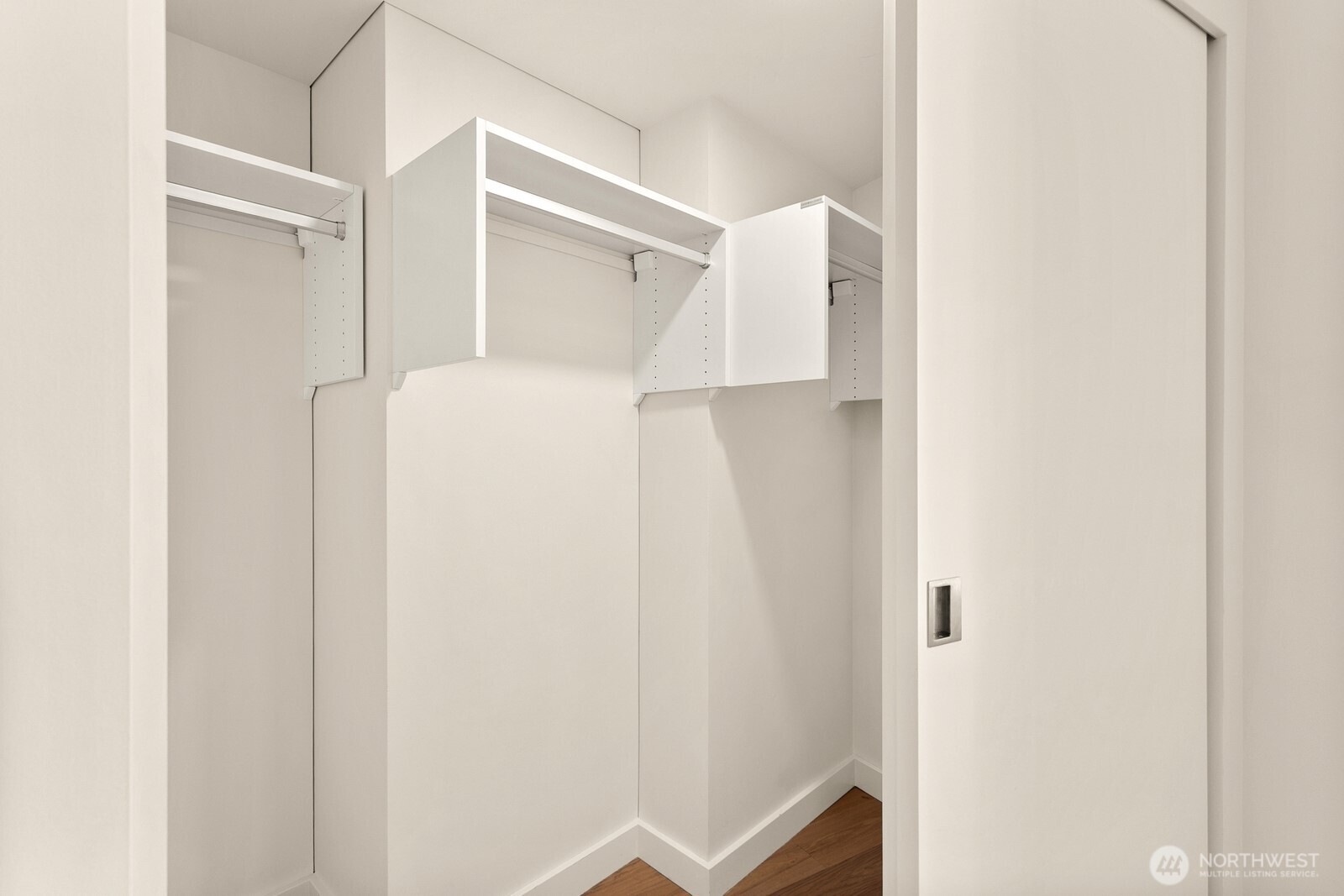 121 Stewart Street, Unit 1502 Seattle, WA 98101 - Photo 11 of 22 a view of hallway with stairs