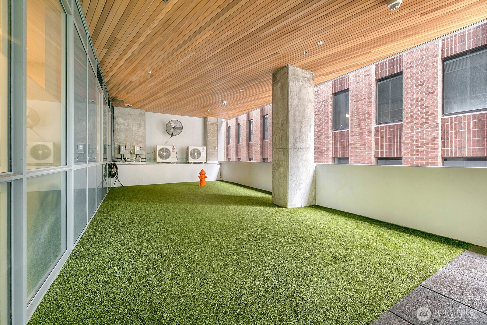 121 Stewart Street, Unit 1502 Seattle, WA 98101 - Photo 18 of 22 a view of an outdoor space with porch and livingroom