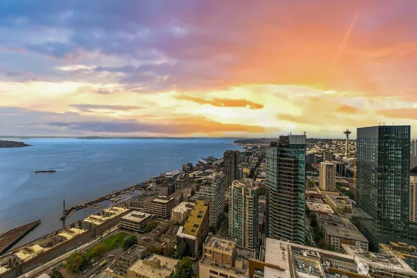 a view of a city with tall buildings