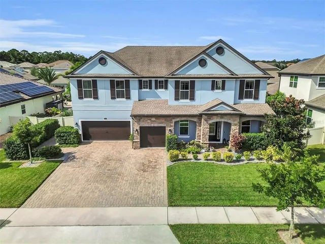 a view of a houses with a swimming pool