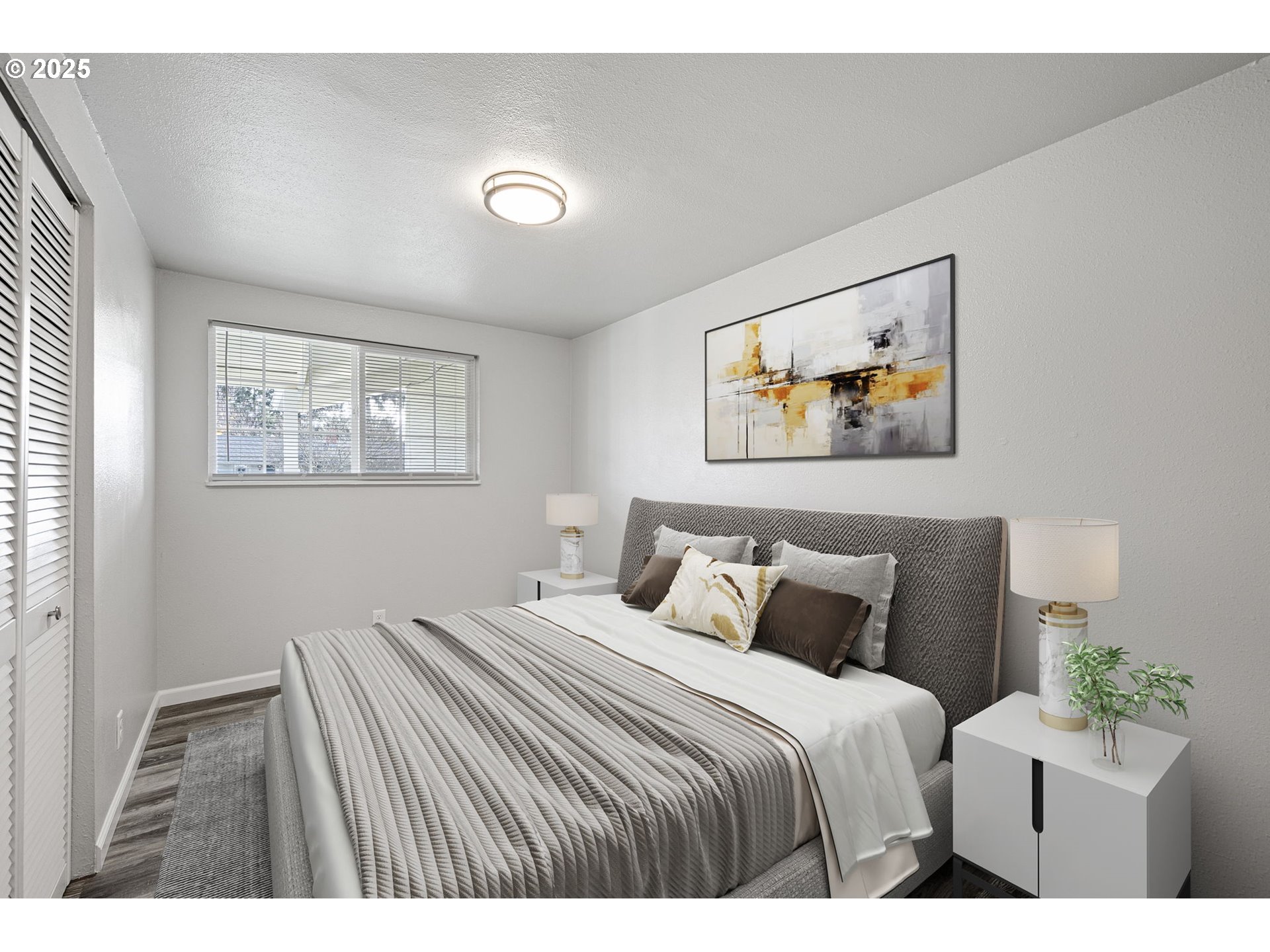 450 U Street Springfield, OR 97477 - Photo 17 of 25 a bedroom with a bed and a painting on the wall