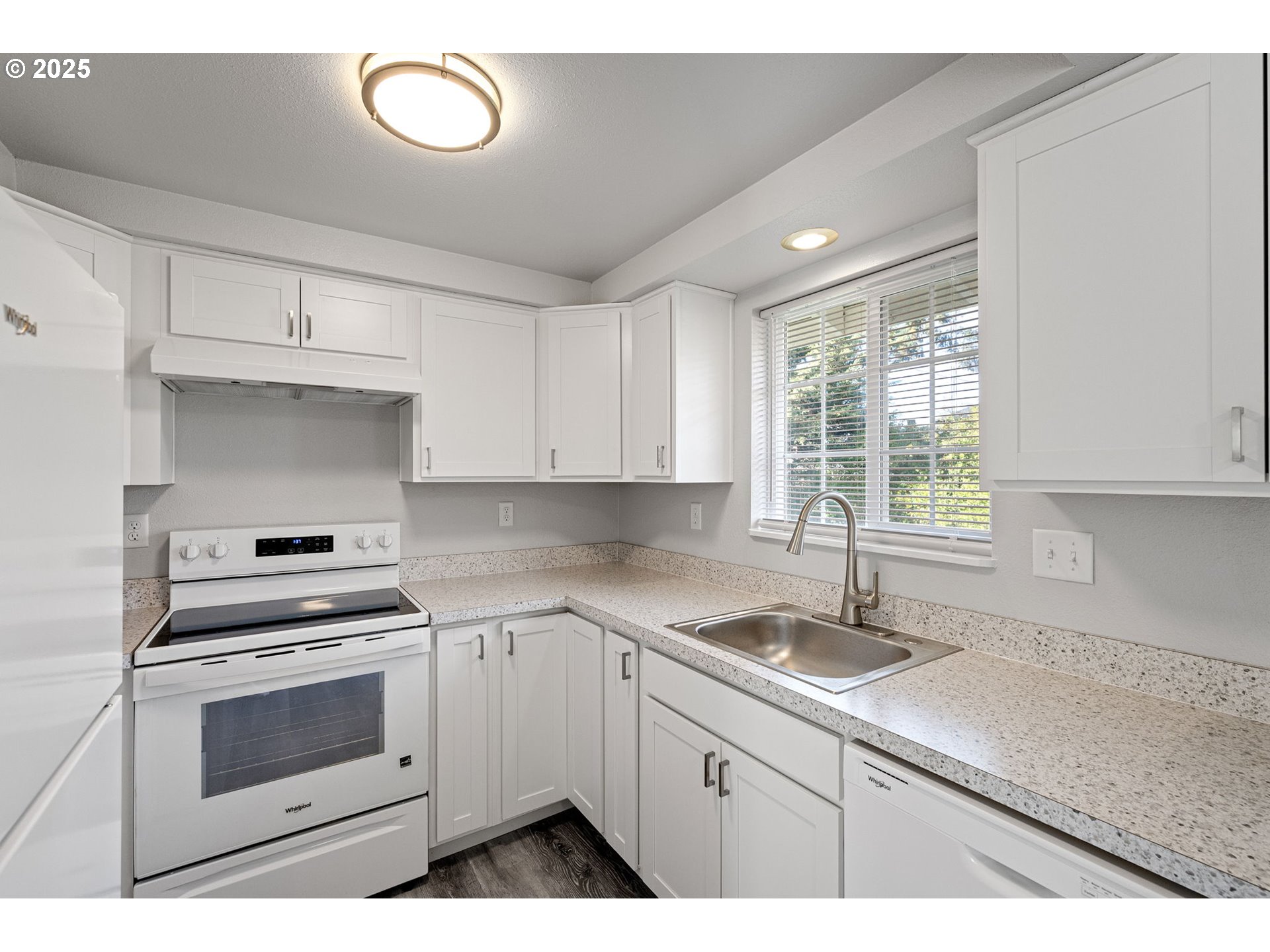 450 U Street Springfield, OR 97477 - Photo 20 of 25 a kitchen with cabinets appliances and a sink