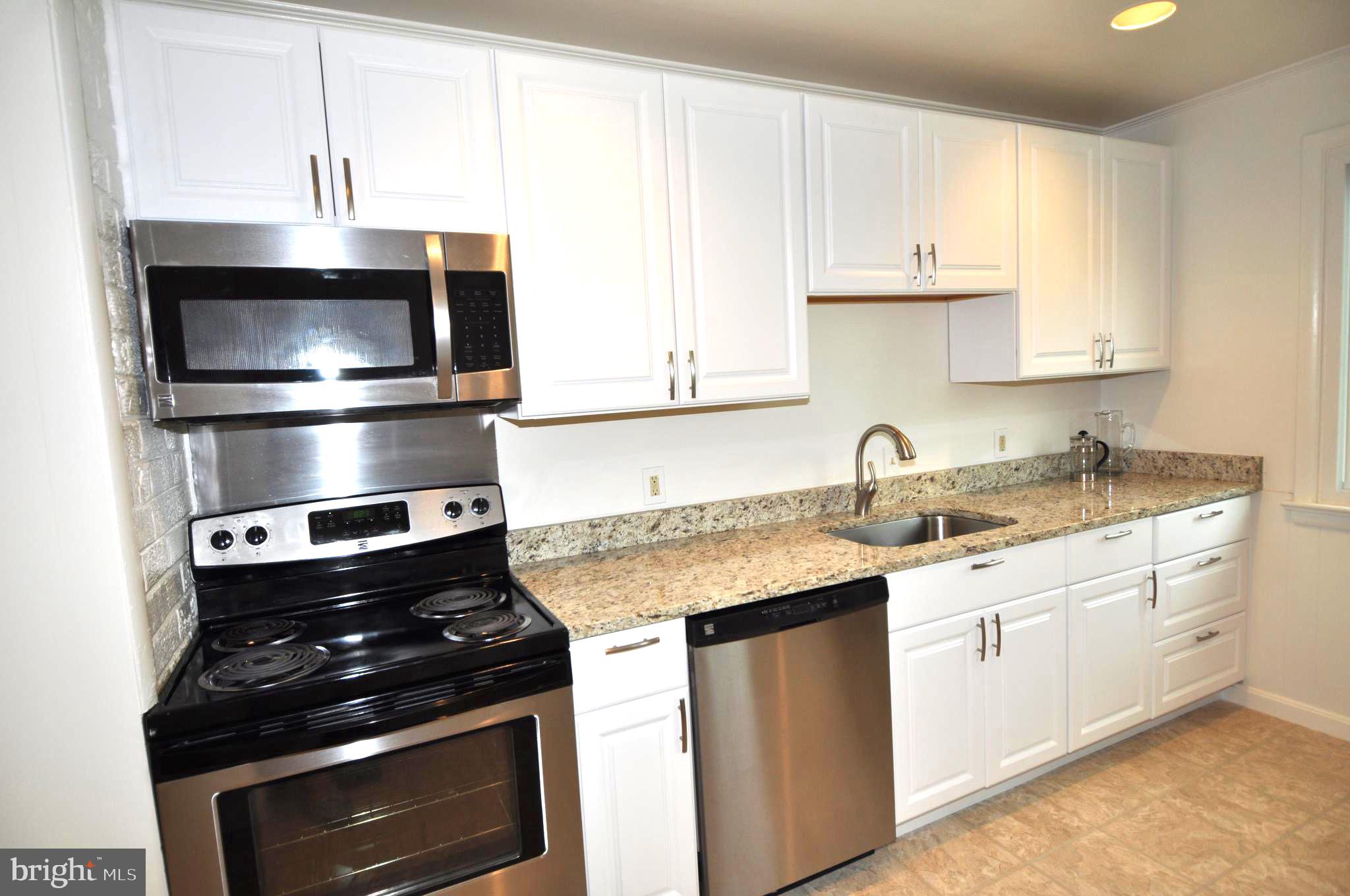 702 Robert Road Rockville, MD 20850 - Photo 4 of 21 Kitchen with Stainless and Granite