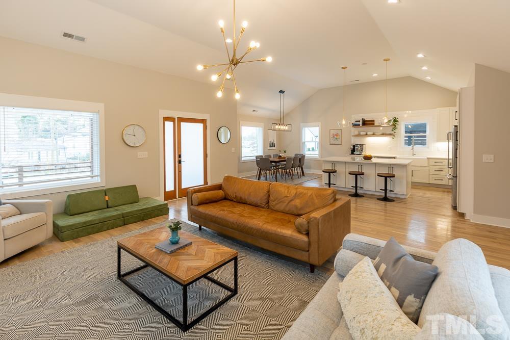 2200 Sheffield Road Raleigh, NC 27610 - Photo 14 of 44 a living room with furniture and a large window