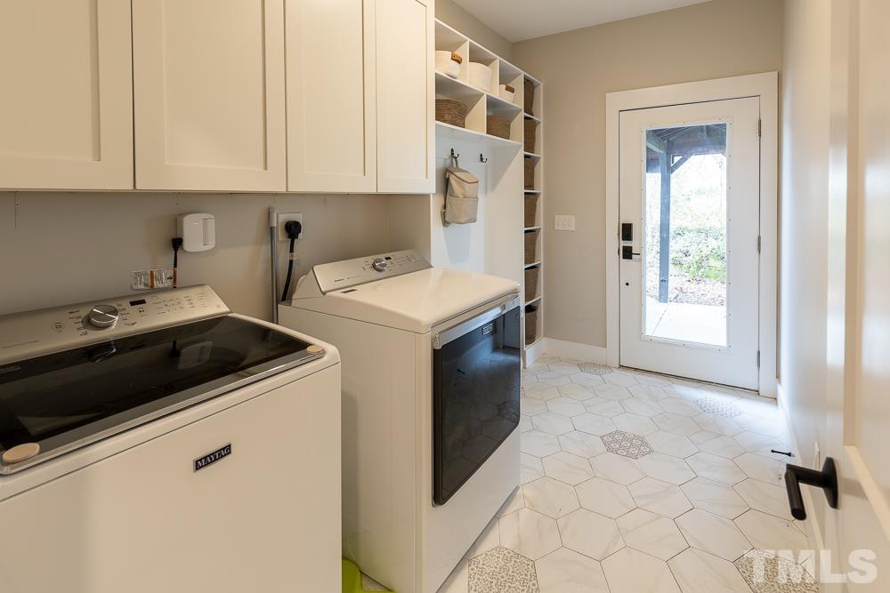 2200 Sheffield Road Raleigh, NC 27610 - Photo 20 of 44 a utility room with dryer and washer