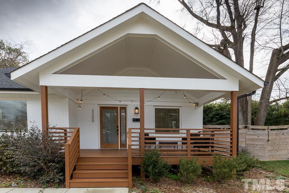 2200 Sheffield Road Raleigh, NC 27610 - Photo 2 of 44 a front view of a house with a yard