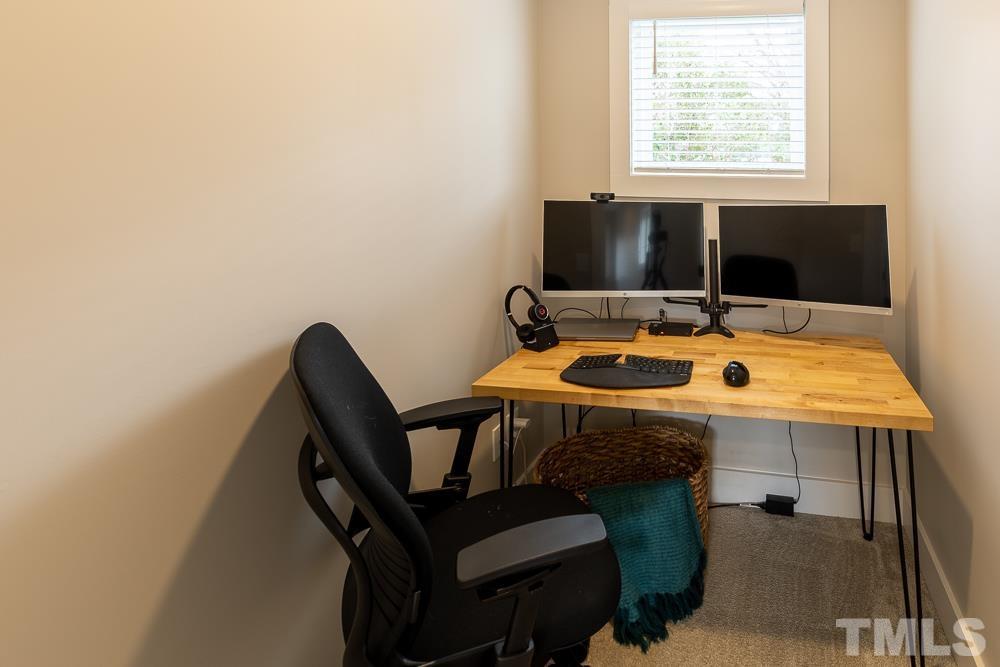 2200 Sheffield Road Raleigh, NC 27610 - Photo 32 of 44 a table and chairs in a room