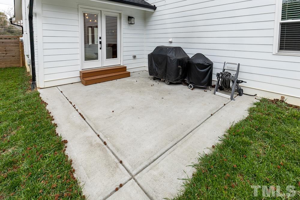 2200 Sheffield Road Raleigh, NC 27610 - Photo 35 of 44 a view of a two chairs in a patio