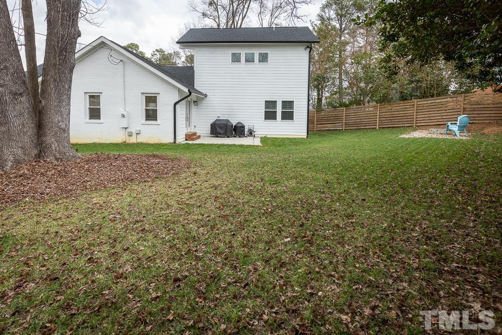 2200 Sheffield Road Raleigh, NC 27610 - Photo 38 of 44 a view of a house with a yard
