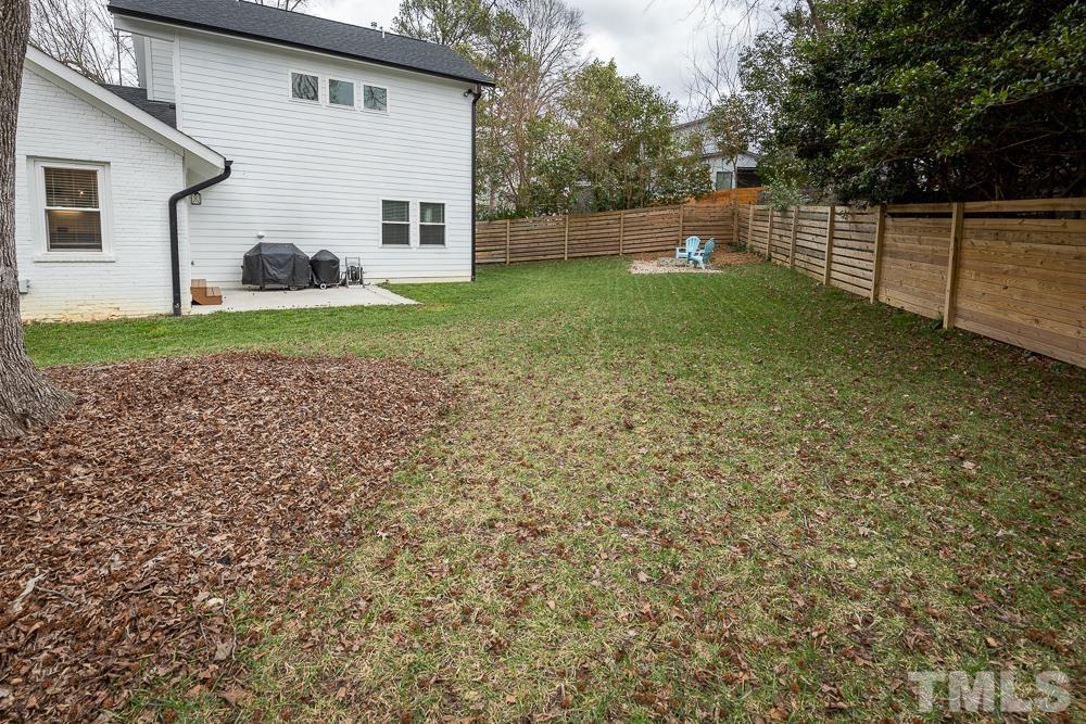 2200 Sheffield Road Raleigh, NC 27610 - Photo 39 of 44 a view of a house with a yard