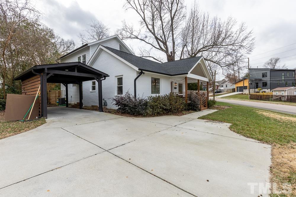 2200 Sheffield Road Raleigh, NC 27610 - Photo 41 of 44 a front view of a house with garden