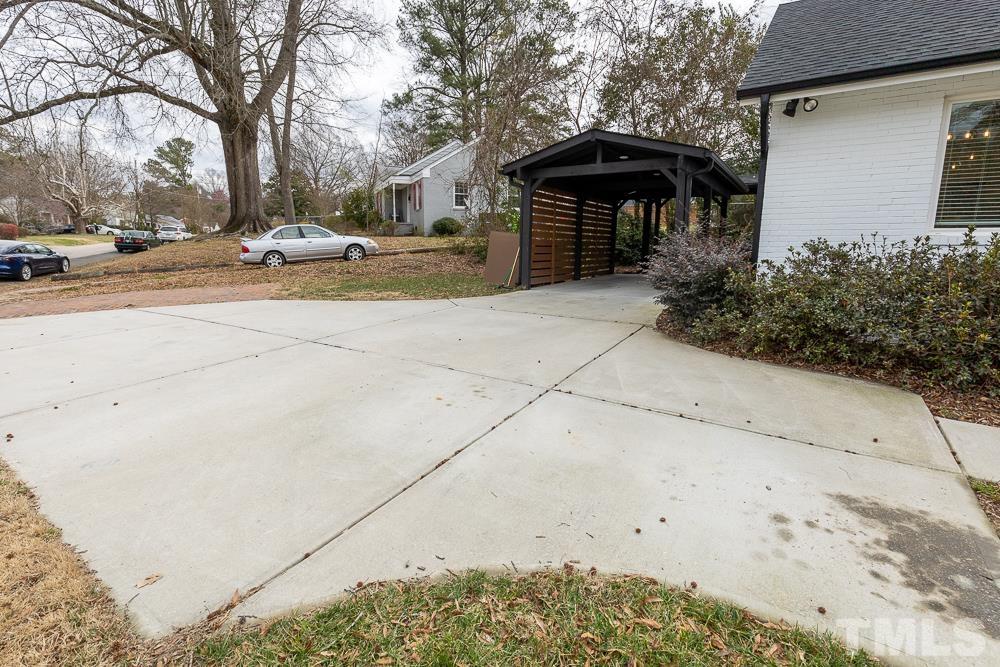 2200 Sheffield Road Raleigh, NC 27610 - Photo 42 of 44 front view of a house with a yard