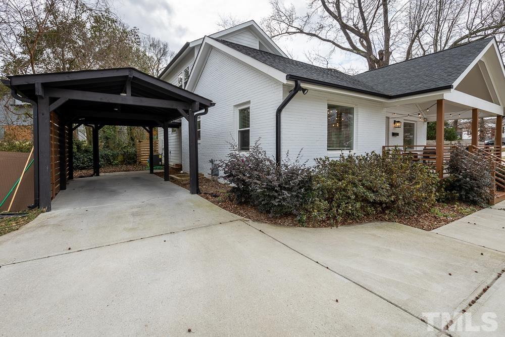 2200 Sheffield Road Raleigh, NC 27610 - Photo 43 of 44 a front view of a house with garden
