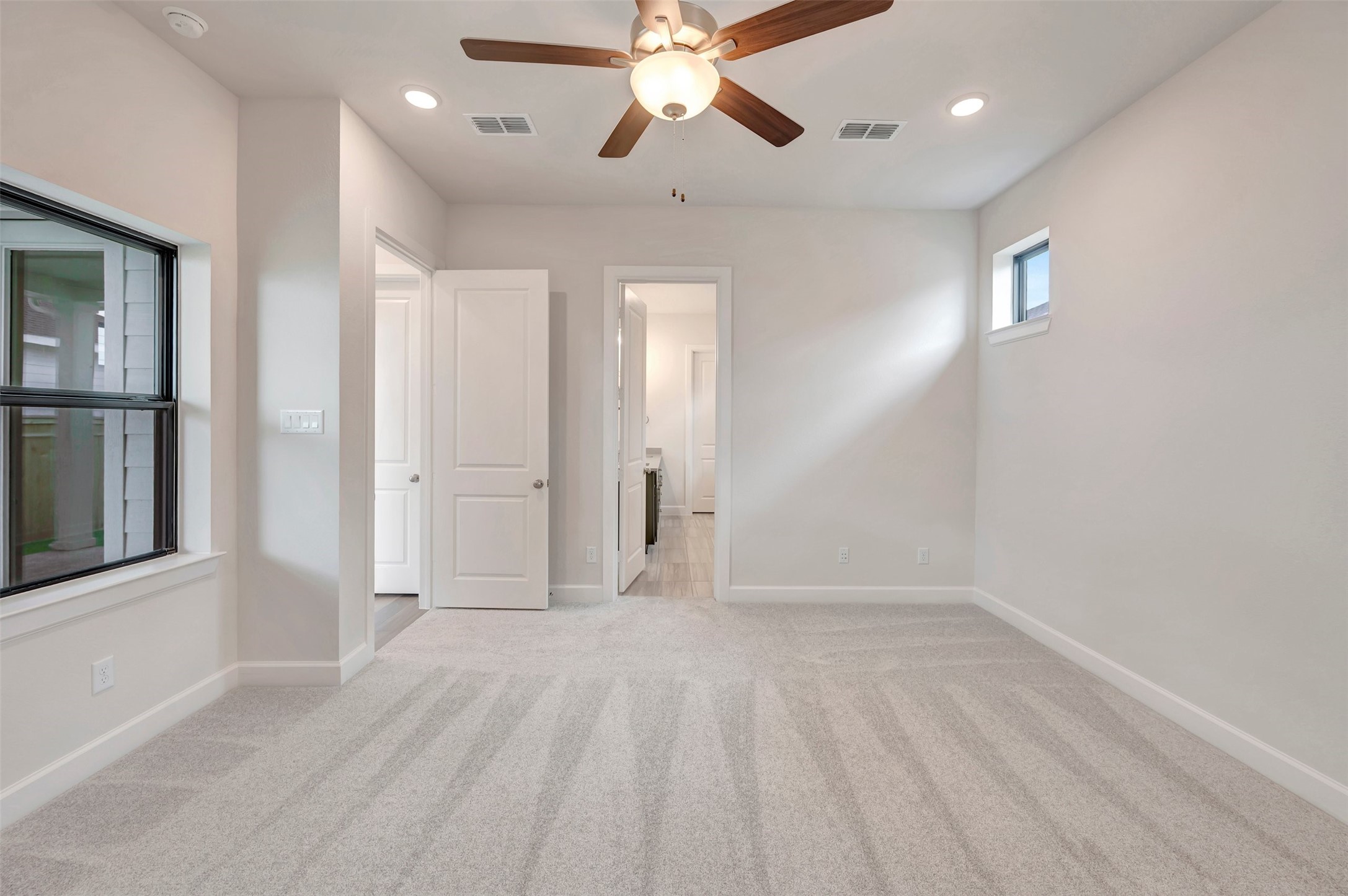 2718 Cottage Place Rosharon, TX 77583 - Photo 33 of 50 wooden floor in an empty room with a window