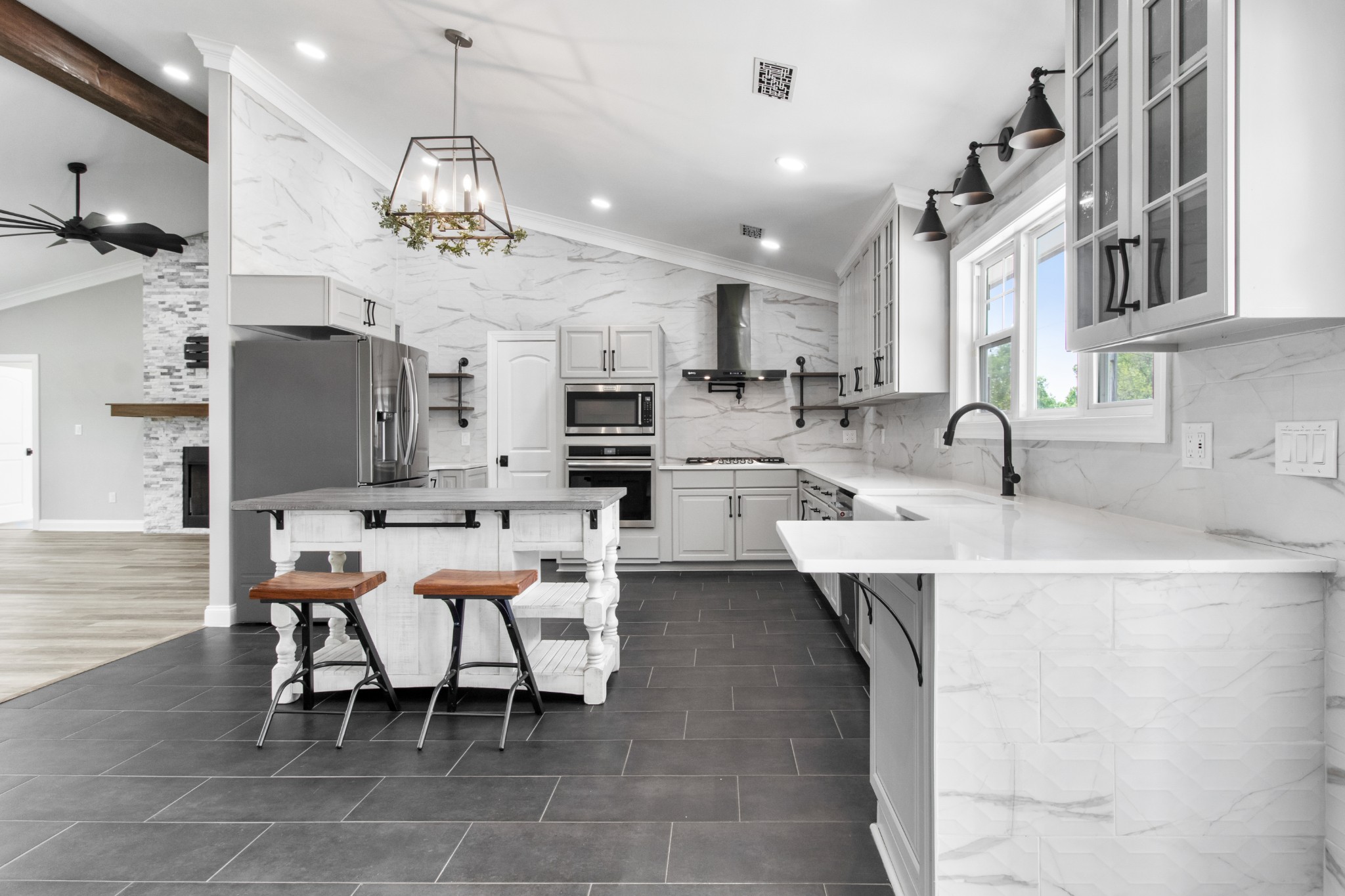 209 Hawkins Road Clarksville, TN 37040 - Photo 12 of 39 a kitchen with cabinets and chairs
