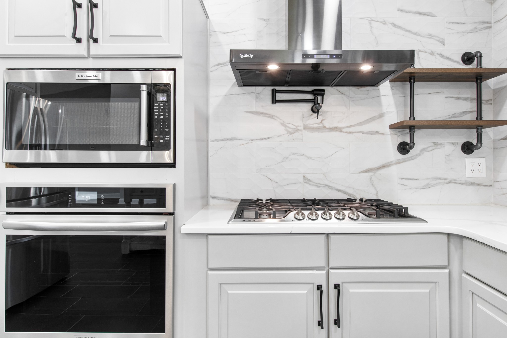 209 Hawkins Road Clarksville, TN 37040 - Photo 14 of 39 a kitchen with a stove and cabinets
