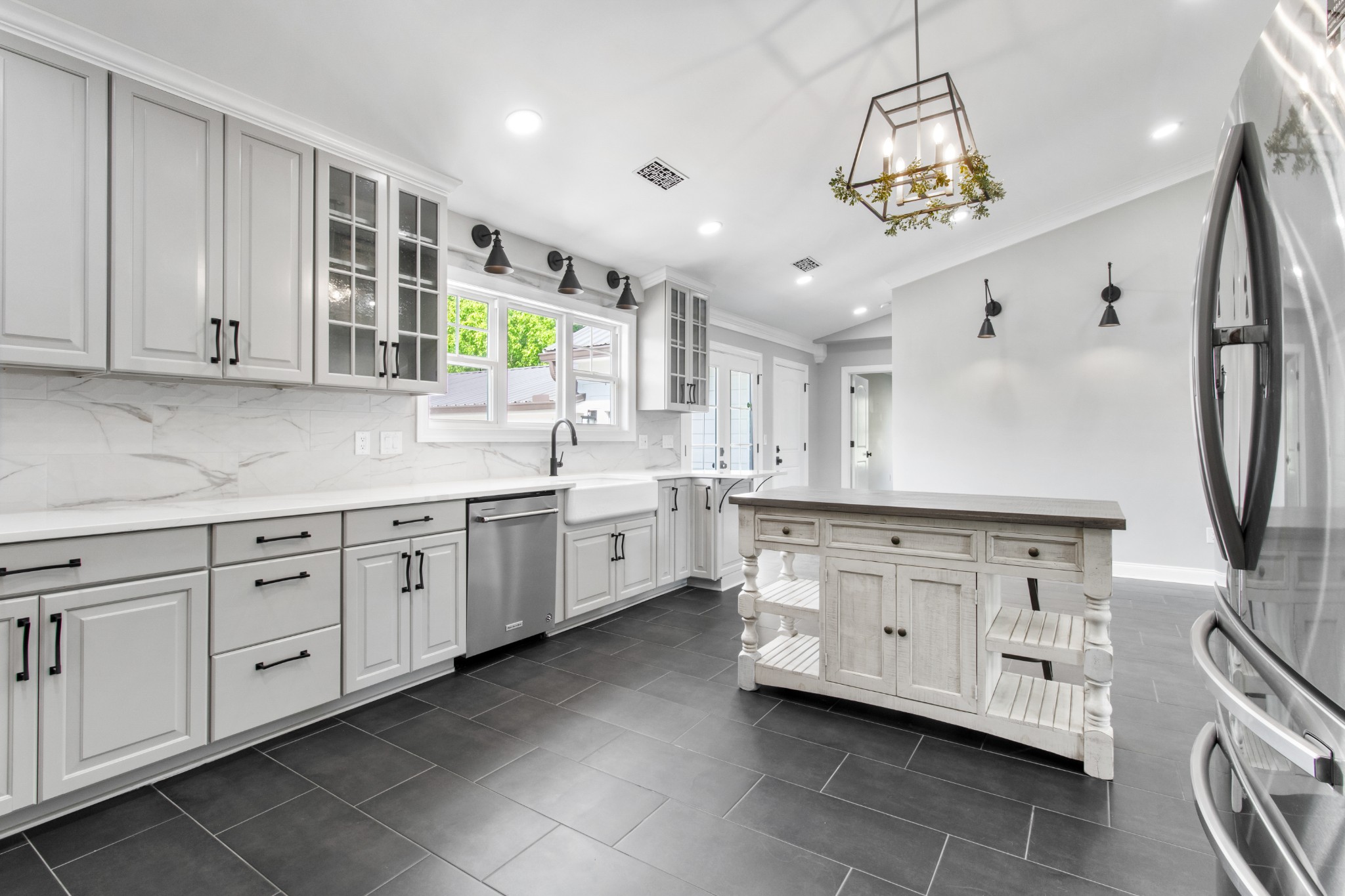 209 Hawkins Road Clarksville, TN 37040 - Photo 15 of 39 a kitchen with granite countertop white cabinets and white appliances