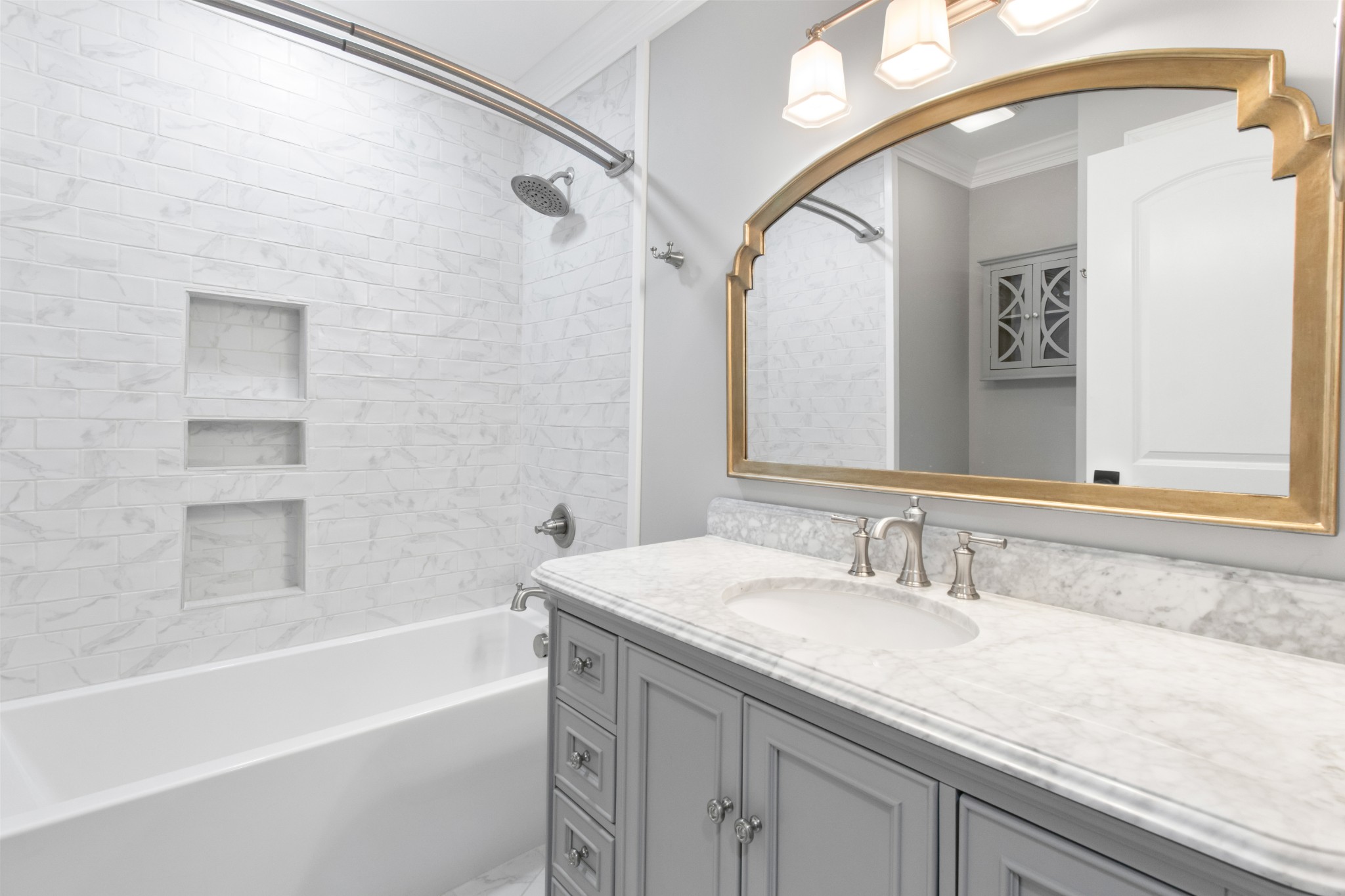 209 Hawkins Road Clarksville, TN 37040 - Photo 16 of 39 a bathroom with a granite countertop sink a mirror a shower and a bathtub