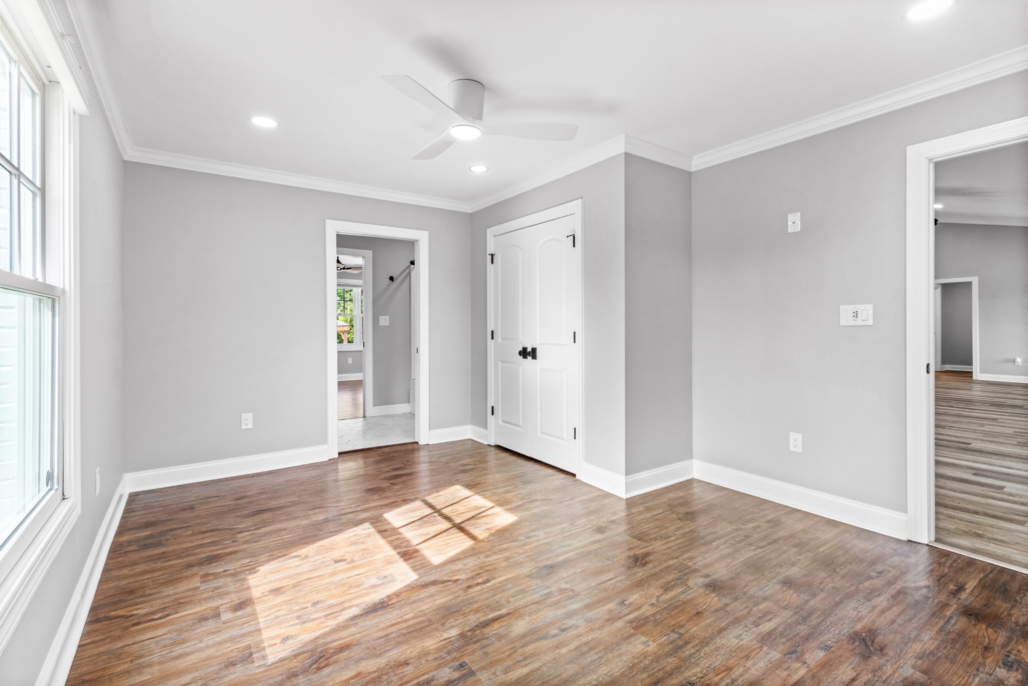 209 Hawkins Road Clarksville, TN 37040 - Photo 26 of 39 a view of an empty room with wooden floor and a window