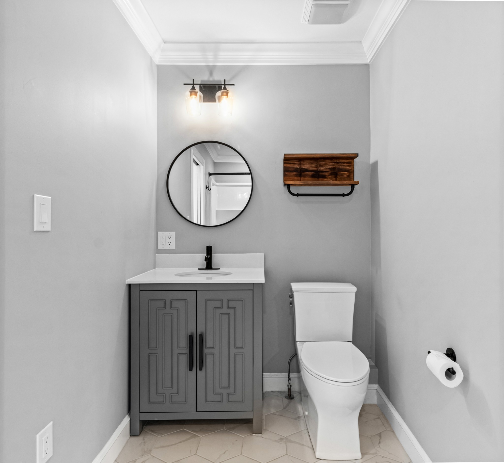 209 Hawkins Road Clarksville, TN 37040 - Photo 28 of 39 a bathroom with a toilet a sink and a mirror