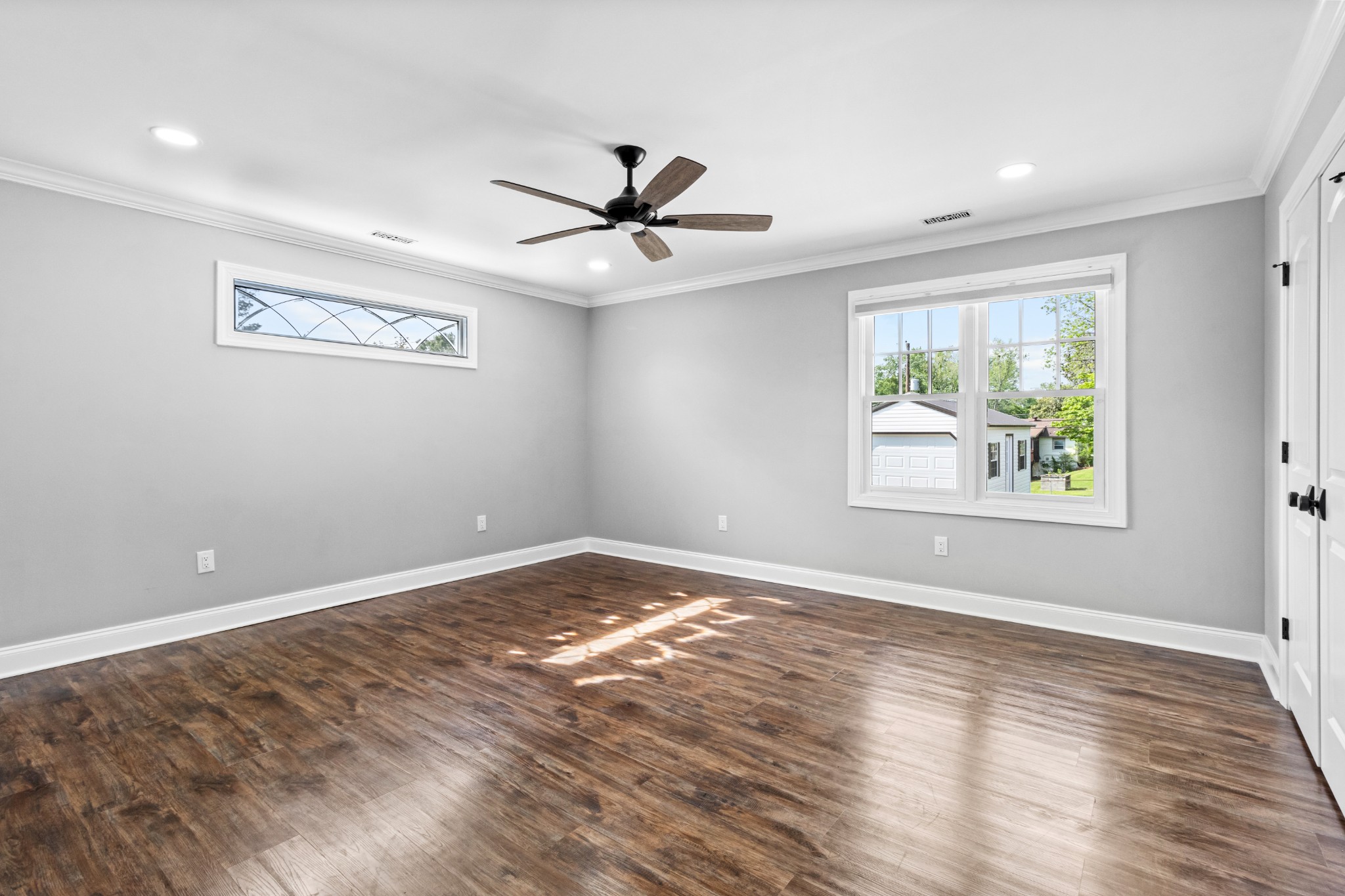 209 Hawkins Road Clarksville, TN 37040 - Photo 30 of 39 a view of an empty room with wooden floor and a window
