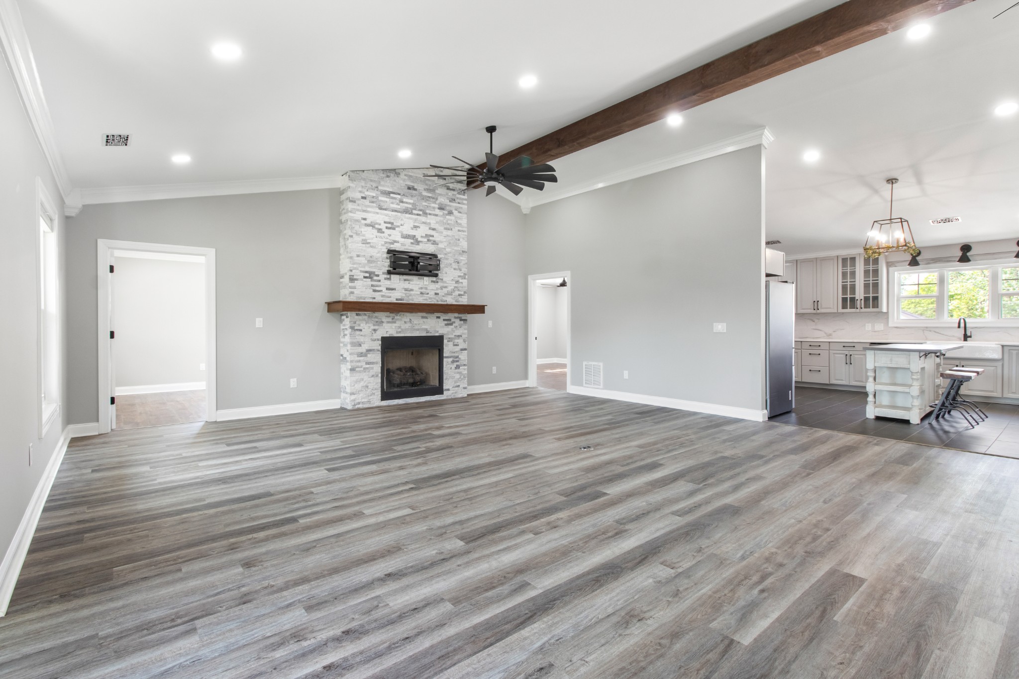 209 Hawkins Road Clarksville, TN 37040 - Photo 6 of 39 a view of empty room with wooden floor and fireplace