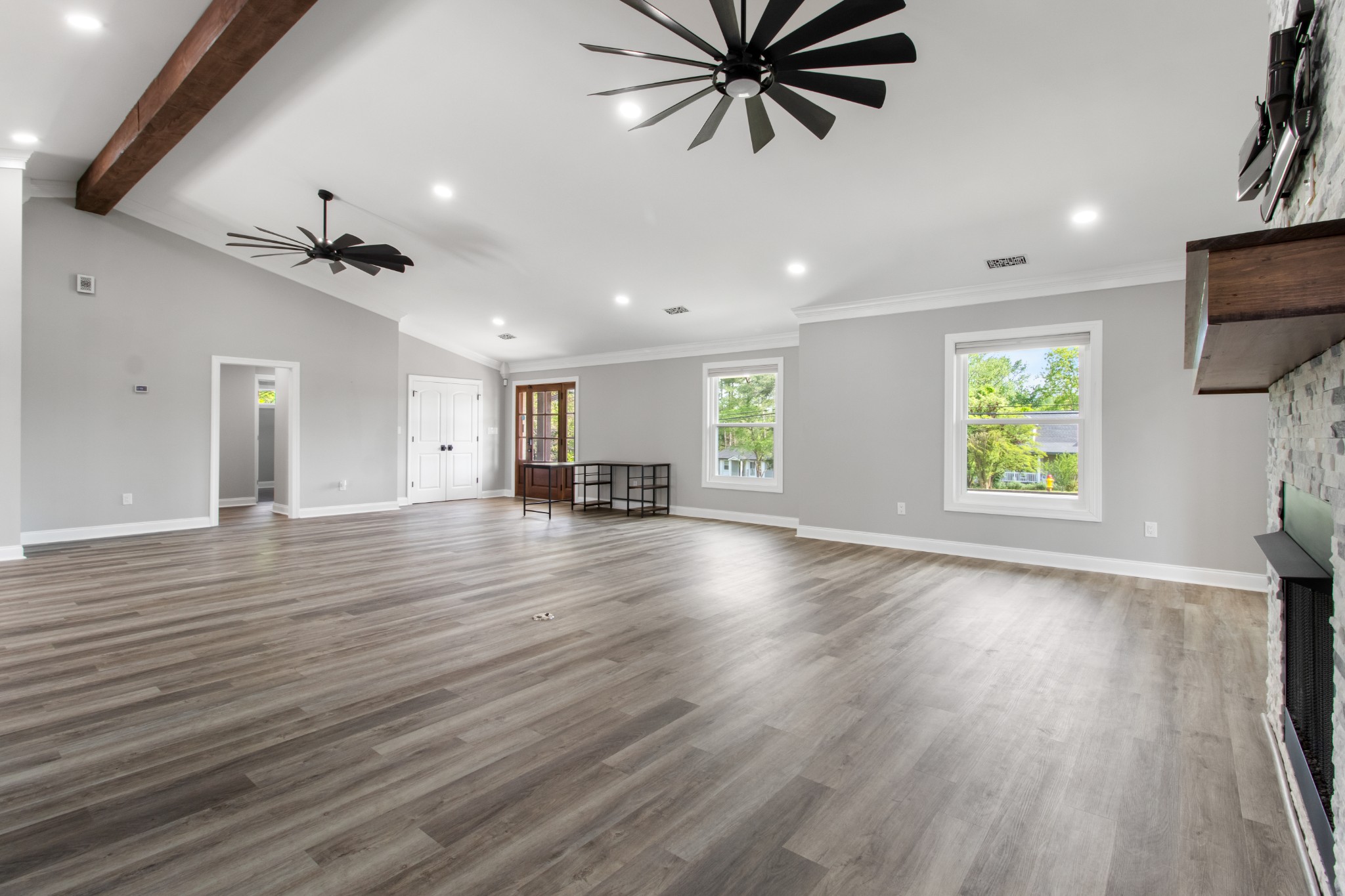 209 Hawkins Road Clarksville, TN 37040 - Photo 7 of 39 wooden floor in an empty room with a window
