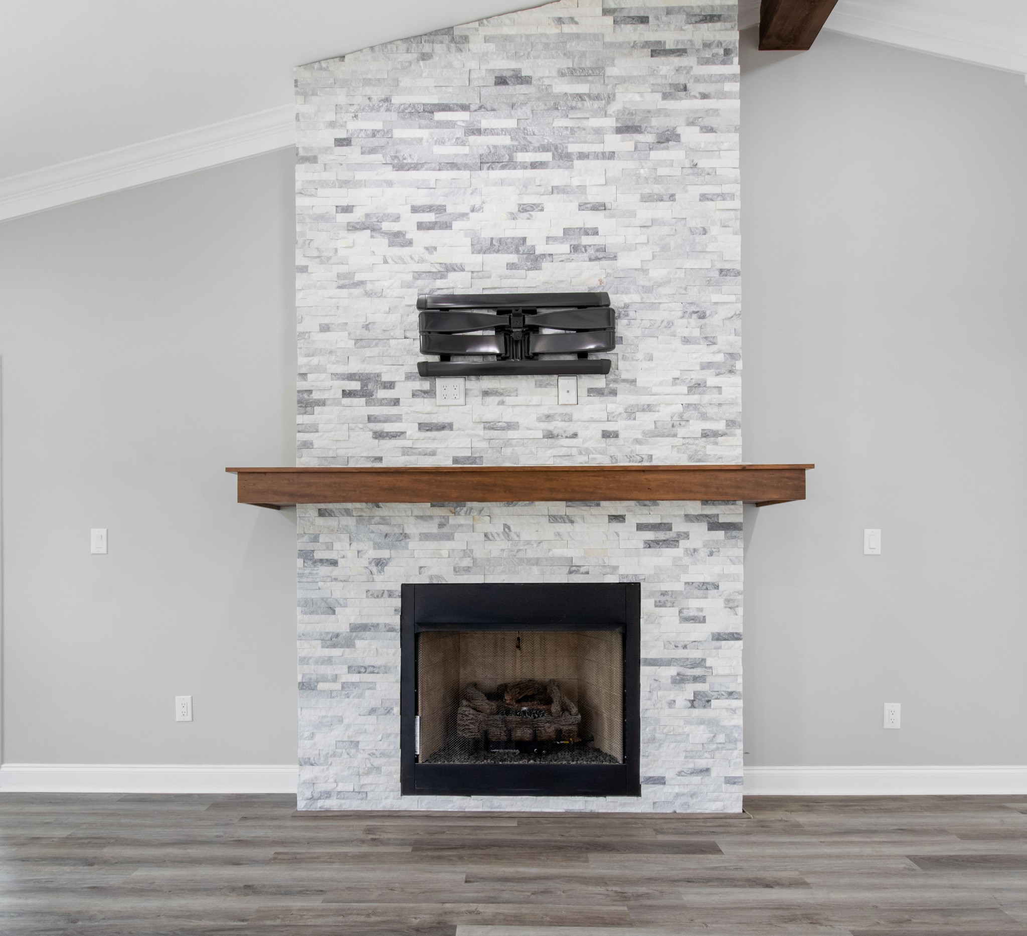 209 Hawkins Road Clarksville, TN 37040 - Photo 8 of 39 a stone fireplace with a hallway