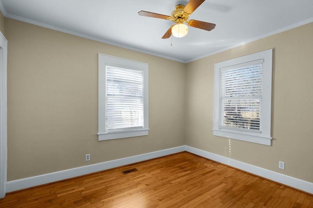 611 Briarwood Circle Northwest Rome, GA 30165 - Photo 17 of 25 a view of an empty room with window and wooden floor