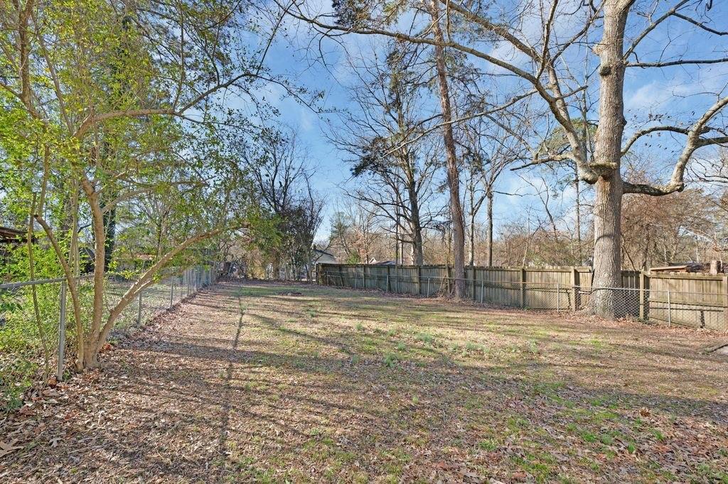 611 Briarwood Circle Northwest Rome, GA 30165 - Photo 25 of 25 a view of a yard with large trees