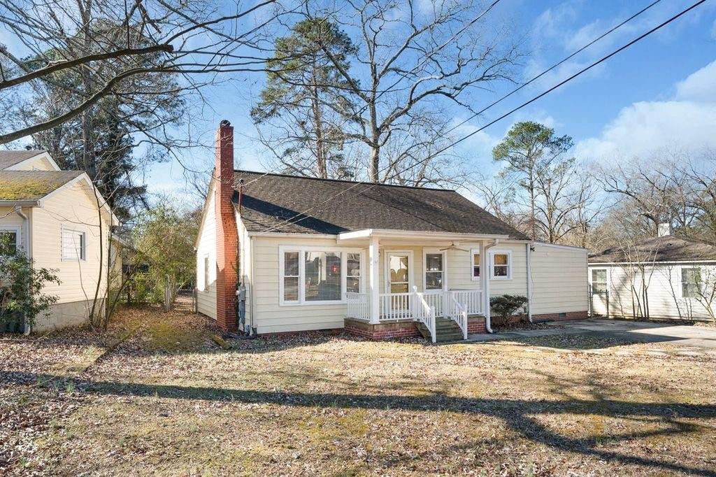 611 Briarwood Circle Northwest Rome, GA 30165 - Photo 4 of 25 a front view of a house with a yard and garage